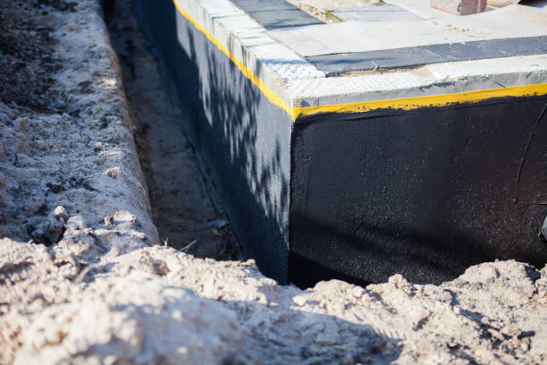 Professional Waterproofing technician working in Dalton, PA